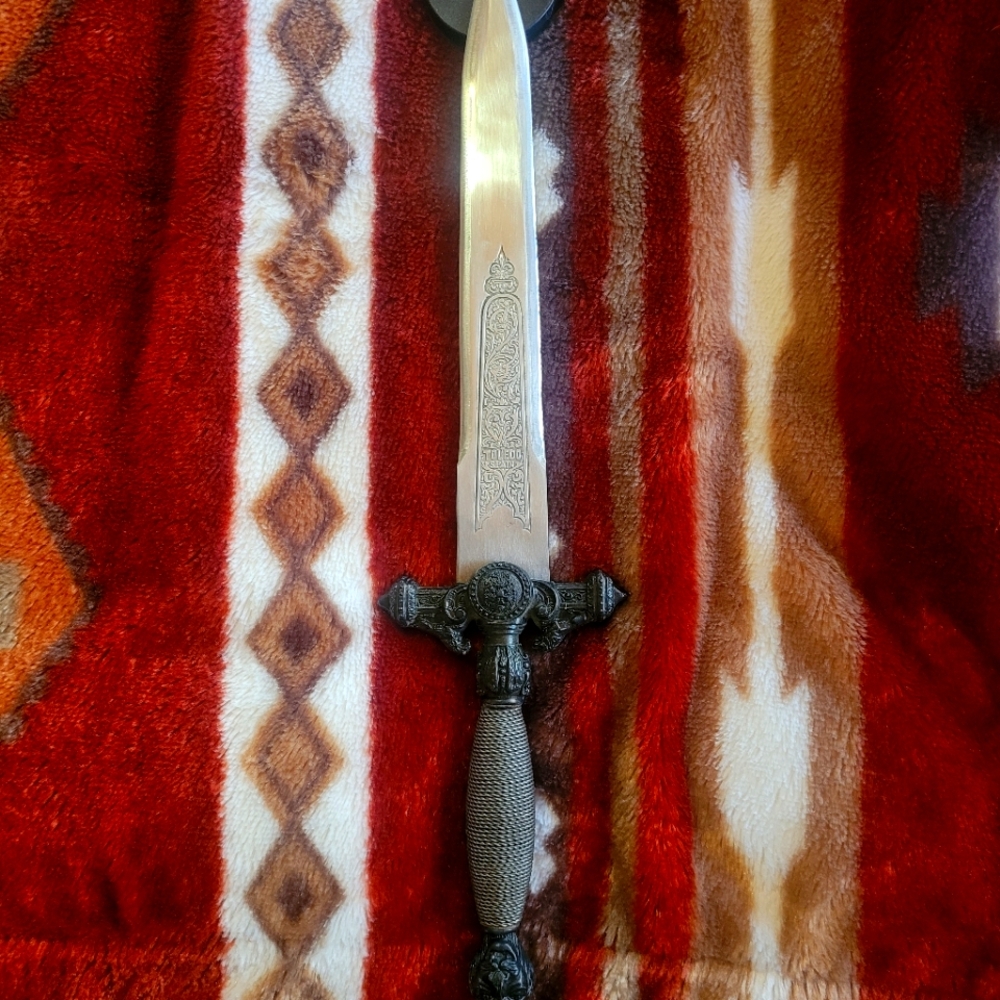 Decorative ornate short sword, dagger made in Toledo Spain.